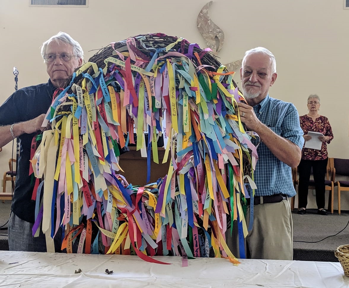 Bill Jensen and carry the UUFBR Legacy Wreath